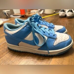 Blue and White Nike UNC sneakers